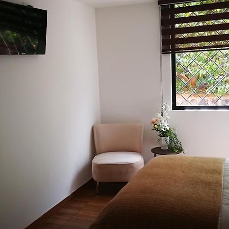 Chapelet Hostal Tababela Buitenkant foto