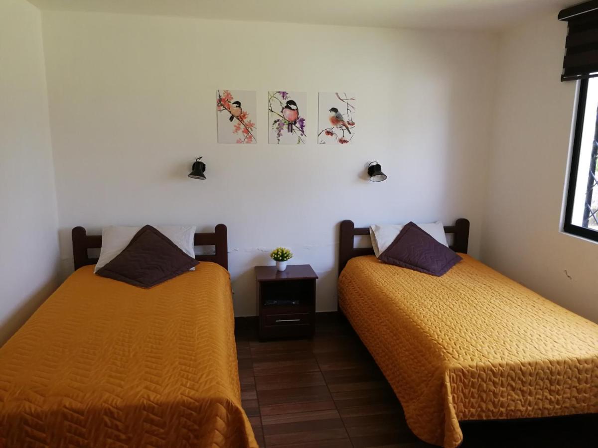 Chapelet Hostal Tababela Buitenkant foto