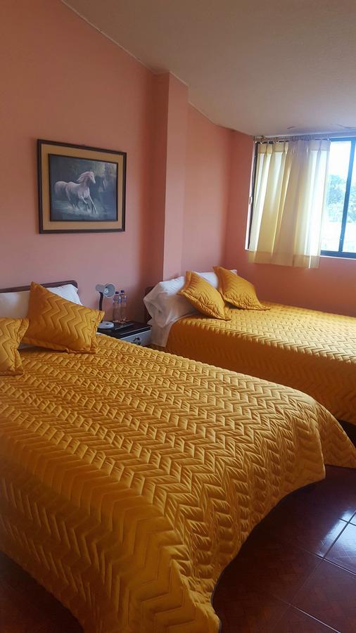 Chapelet Hostal Tababela Buitenkant foto