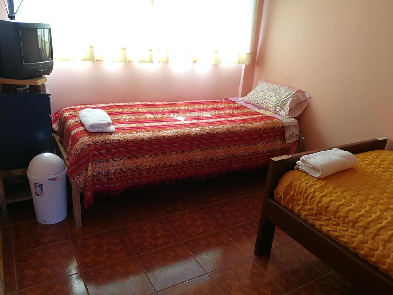Chapelet Hostal Tababela Buitenkant foto